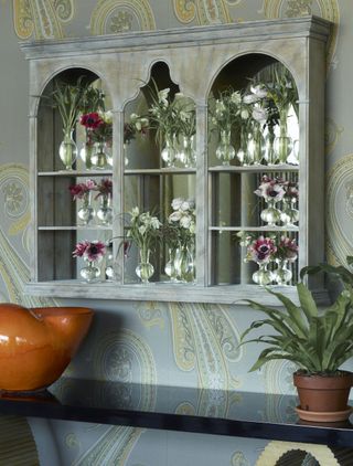 Mirrored cabinet in a Firmdale Hotel by Kit Kemp