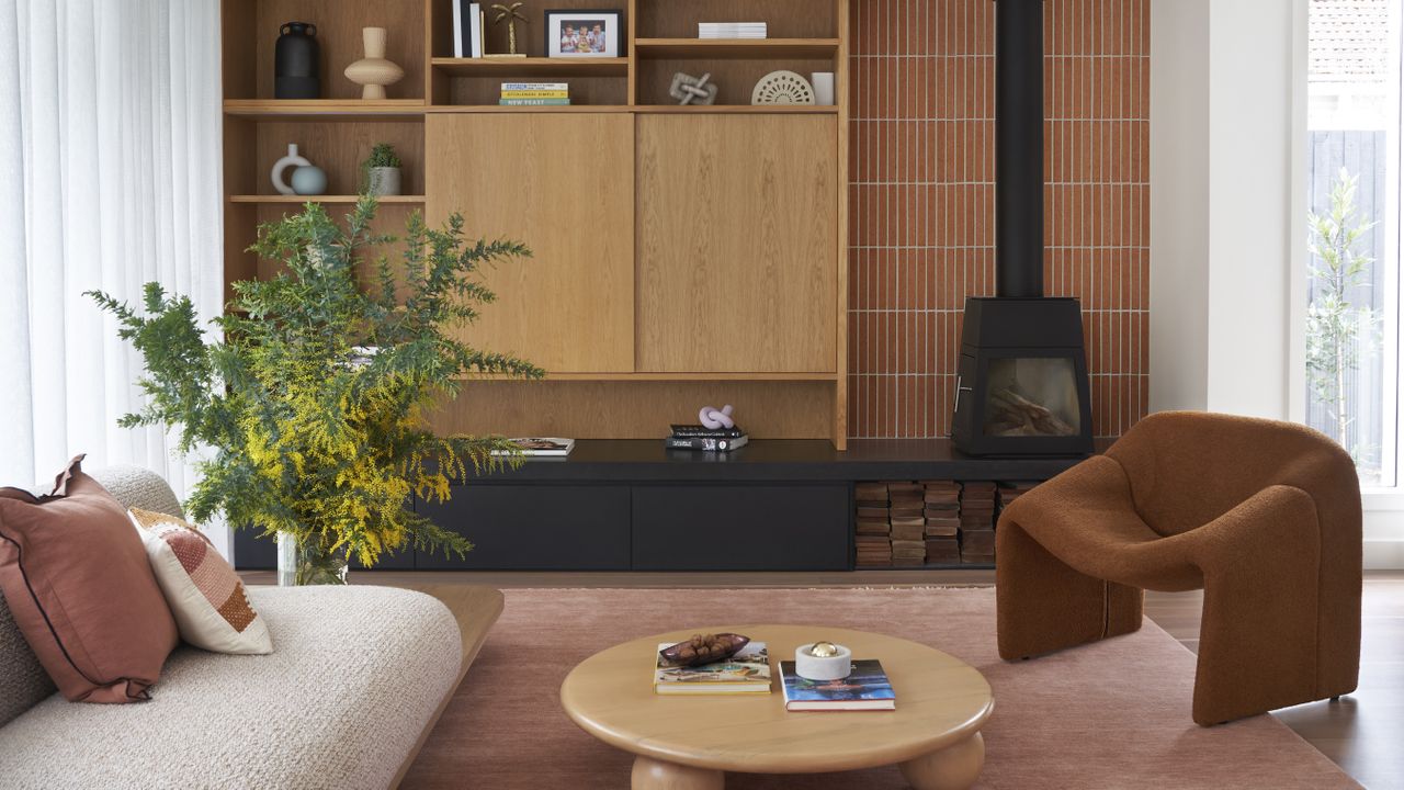 A living room with a cabinet for curios