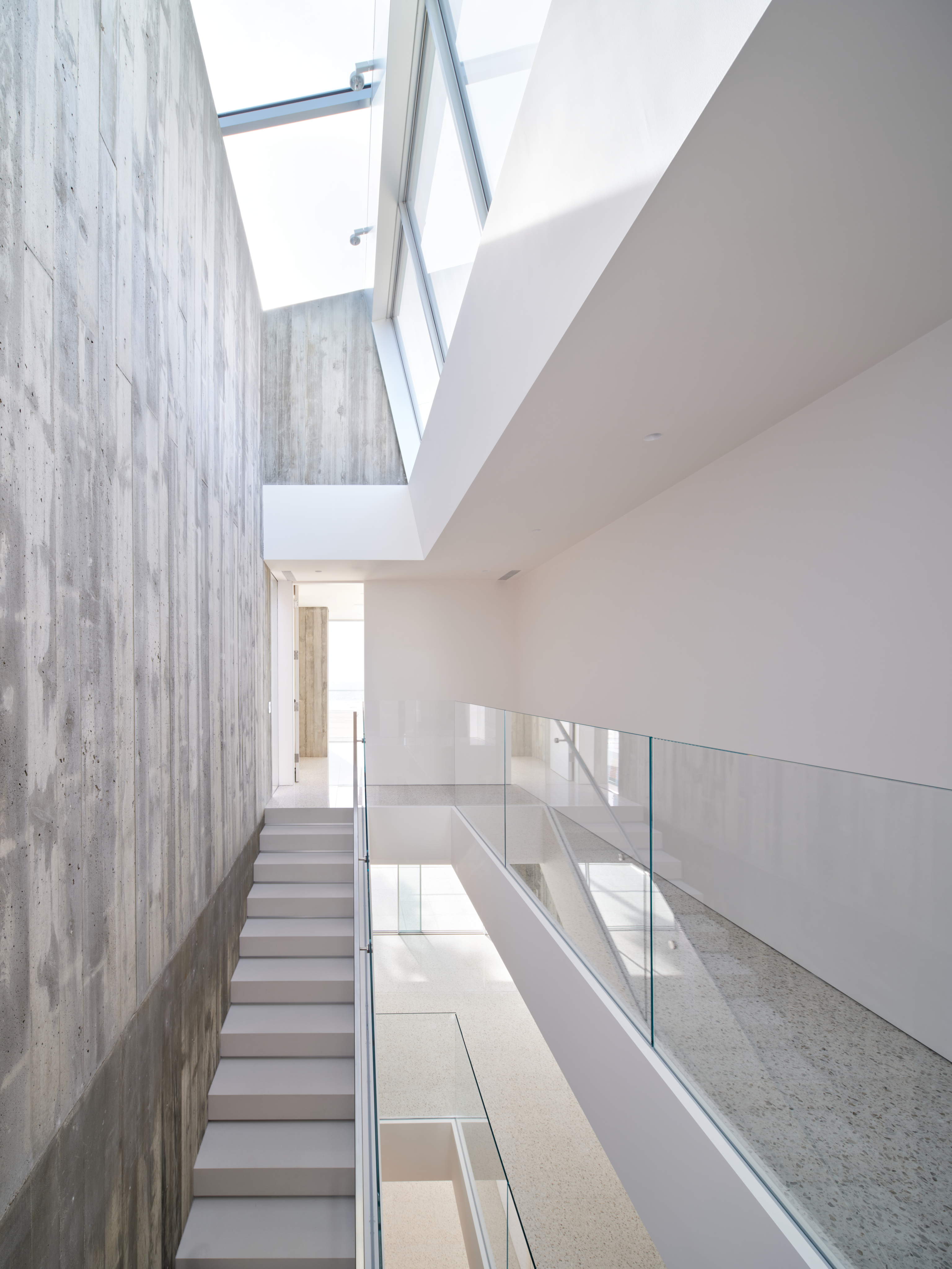 Venice Beach house by Dan Brunn, showing circulation space with light falling from above