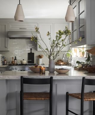 small gray kitchen with counter seating