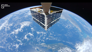 A "selfie" released June 28, 2022 of the NavoAvionics MP42 microsatellite while it was above the Great Barrier Reef of Australia.