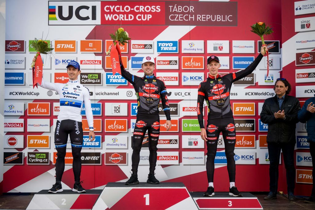 Dutch Lars Van Der Haar Belgian Eli Iserbyt and Belgian Michael Vanthourenhout celebrate on the podium after the men elite race at the World Cup cyclocross cycling event in Tabor Czech Republic stage 3 out of 16 of the UCI World Cup cyclocross competition Sunday 23 October 2022 BELGA PHOTO JASPER JACOBS Photo by JASPER JACOBS BELGA MAG Belga via AFP Photo by JASPER JACOBSBELGA MAGAFP via Getty Images