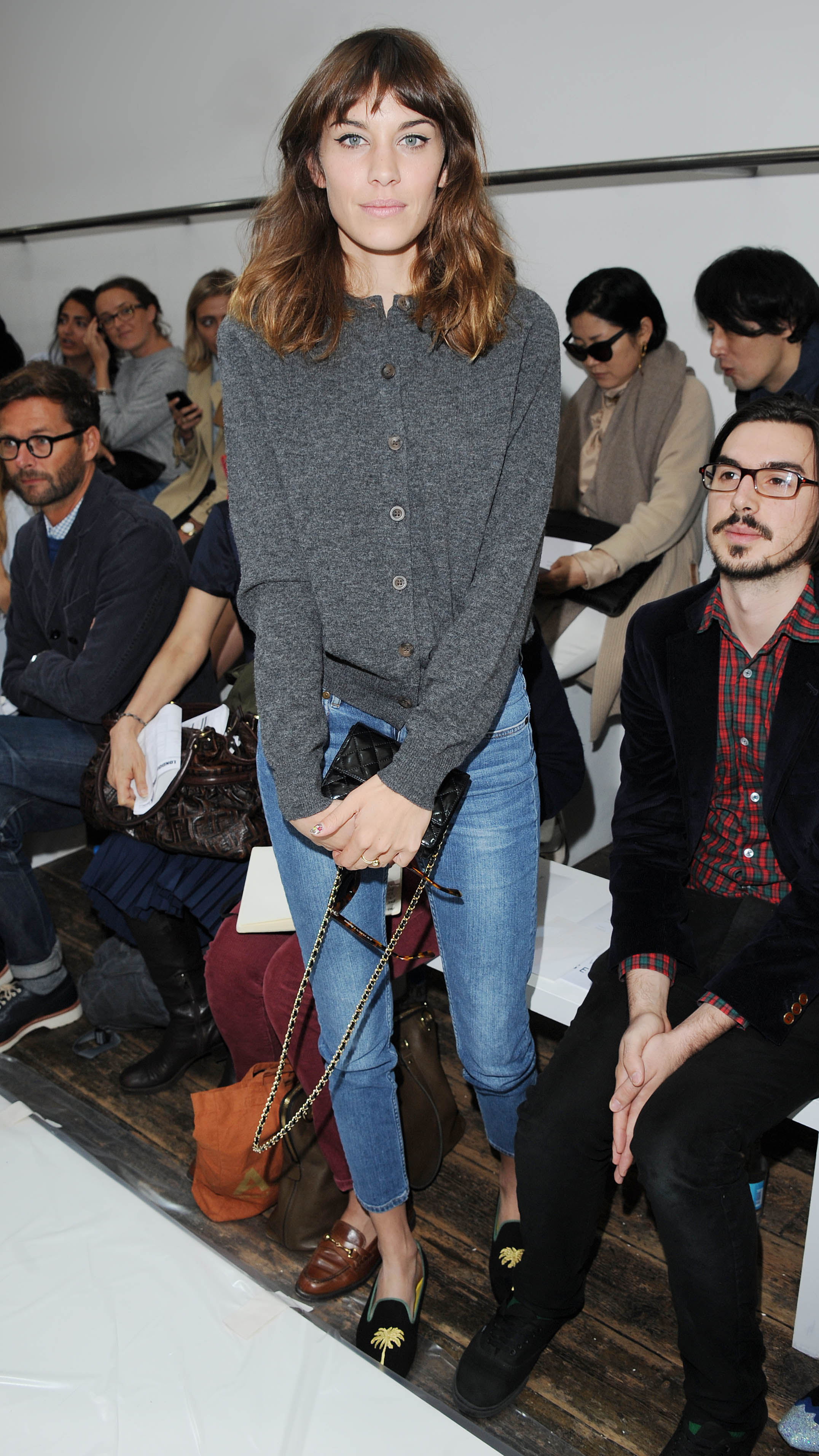 Alexa Chung in 2012 wearing a blue skinny jeans outfit.