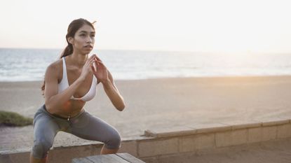 Benefits of squats: woman doing squats