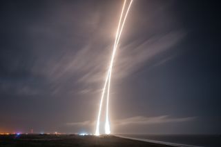 This long exposure captures the launch into orbit of SpaceX's Falcon 9 rocket, and the booster's first stage return to a smooth landing at Cape Canaveral Air Force Station on Dec. 21, 2015.
