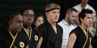 Johnny with some of his students at a competition in Cobra Kai.