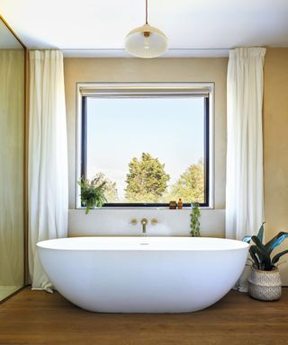 Bath, white curtains, plant