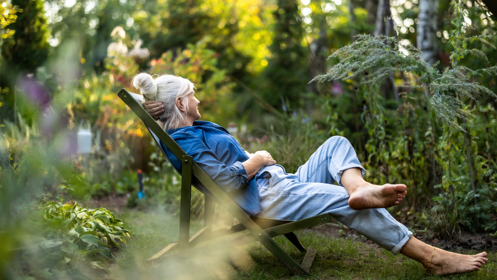 Woman relaxing in a pest-free garden