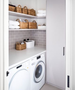 A laundry room with baskets
