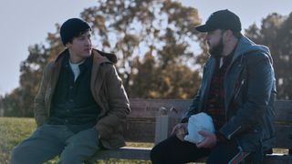 Will (Alex Sharp) and Jack (John Bradley) sitting on a bench in 3 Body Problem