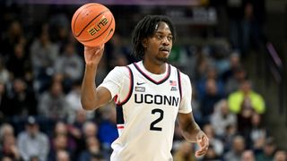  Tristen Newton of the UConn Huskies with the ball 