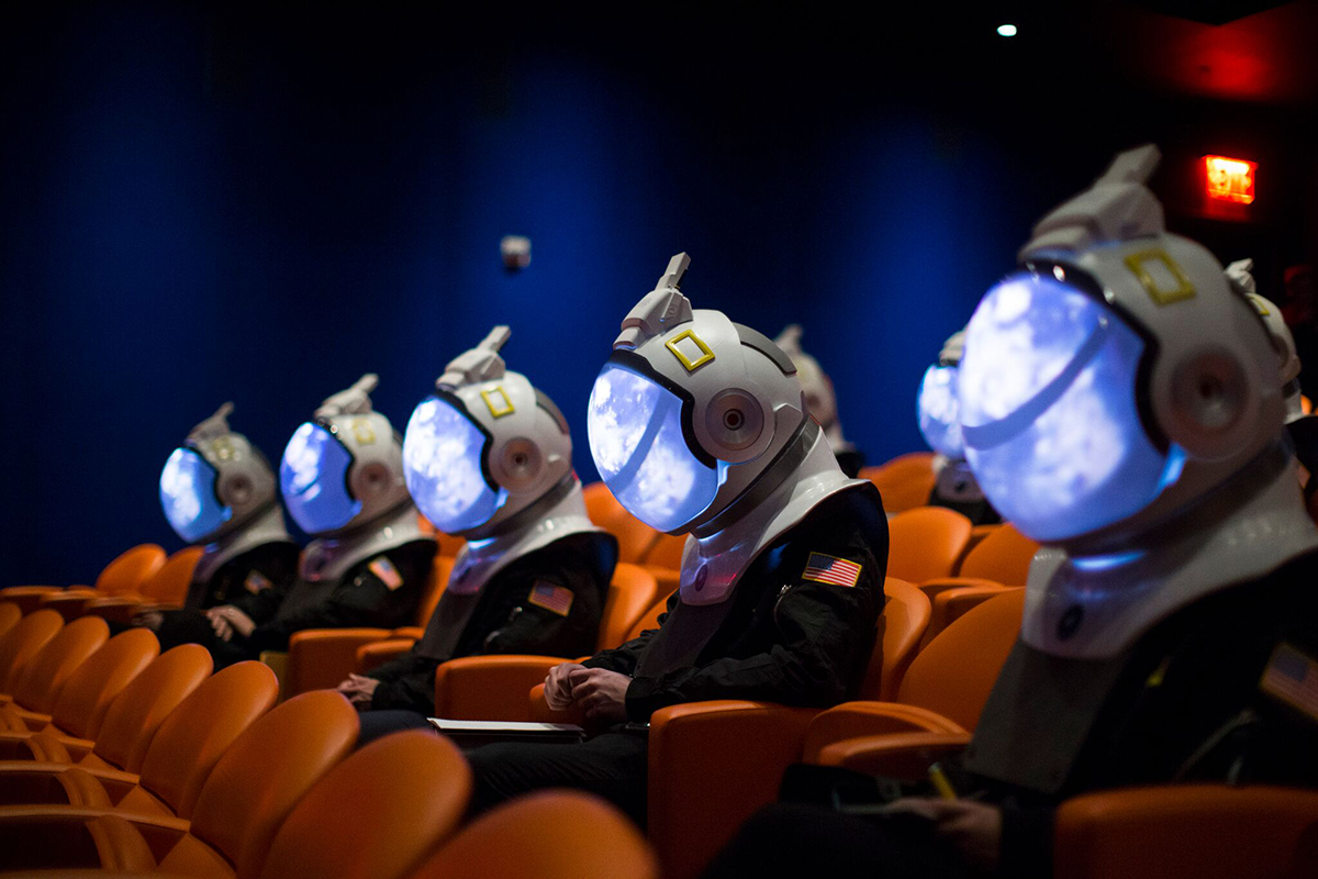 Tiny projectors mounted at the top of the helmets displayed footage on the insides of the visors.