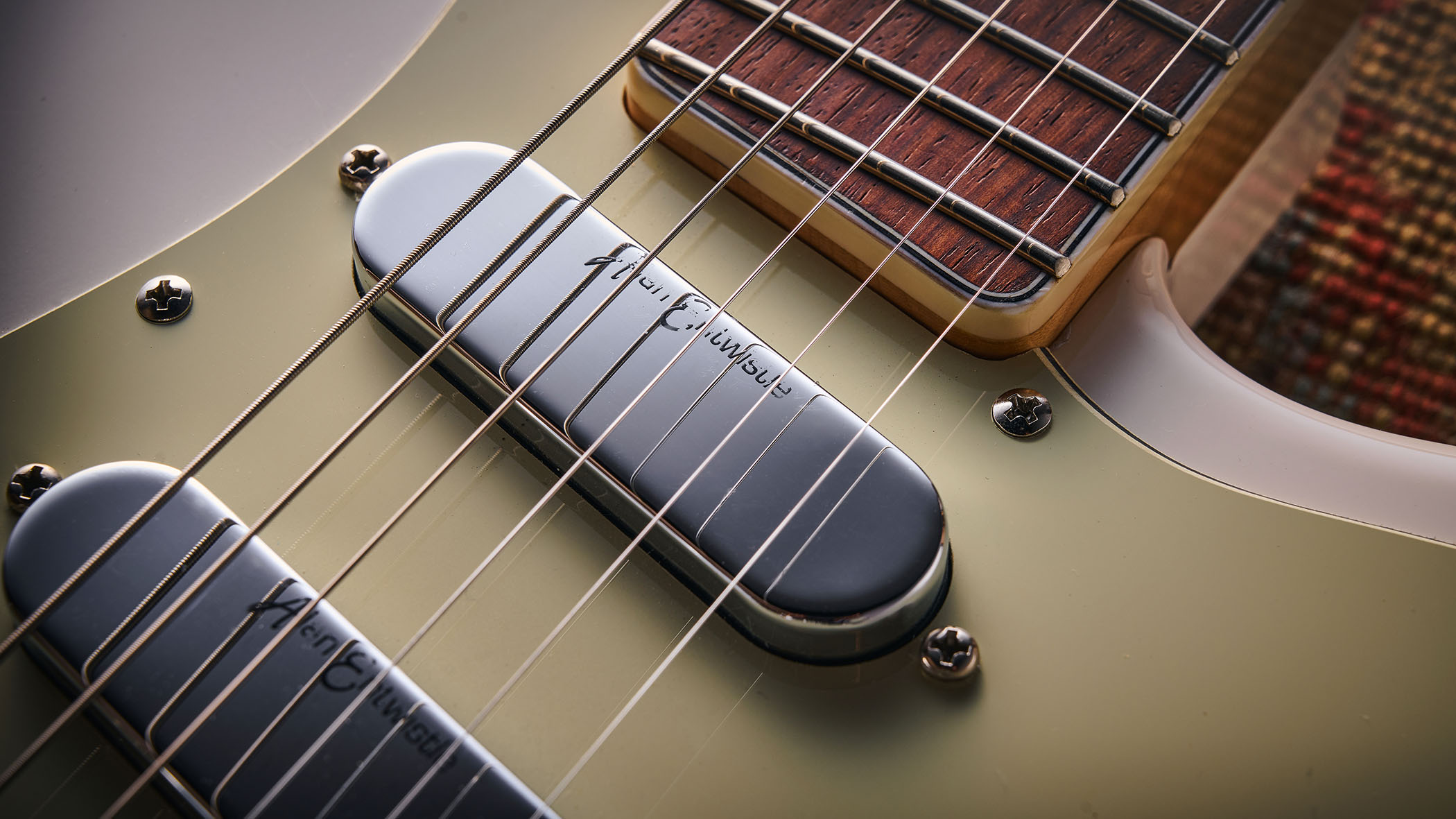 Vintage REVO Astrostar: the retro-inspired electric has three single-coils, a white finish with cream pickguard and is photographed in close-up.