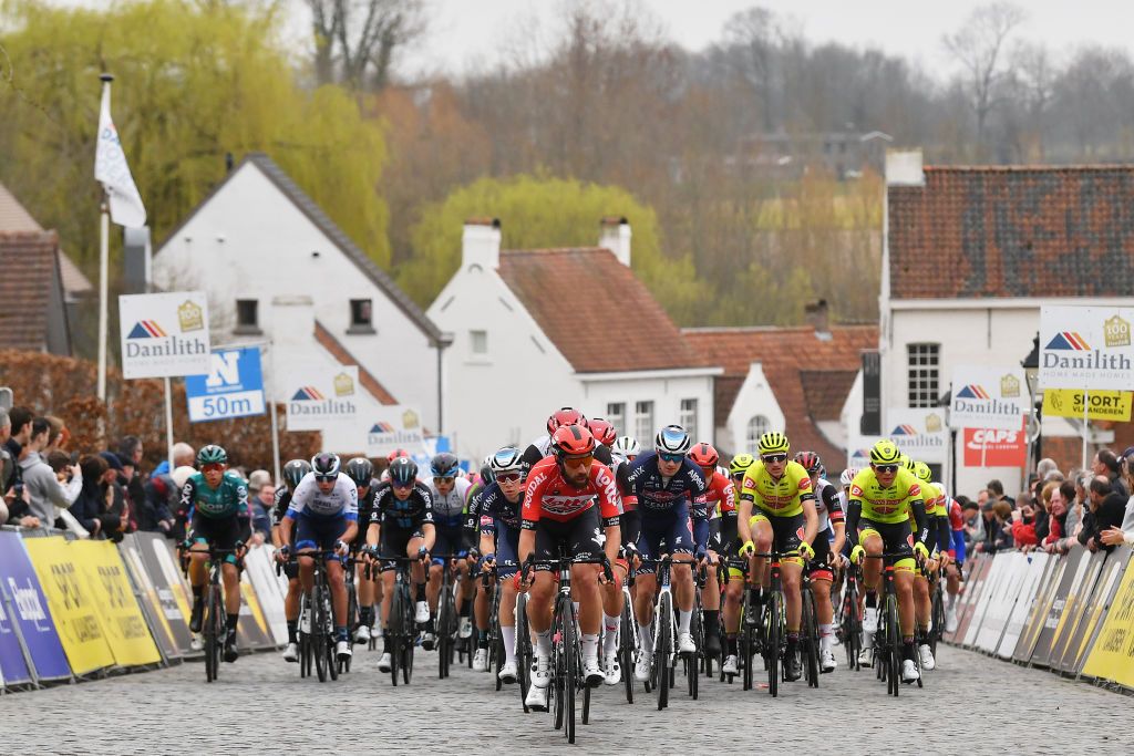 NOKERE BELGIUM MARCH 16 Thomas De Gendt of Belgium and Team Lotto Soudal leads The Peloton during the 76th Danilith Nokere Koerse 2022 Mens Elite a 1898km one day race from Deinze to Nokere NokereKoerse DNK22 on March 16 2022 in Nokere Belgium Photo by Luc ClaessenGetty Images