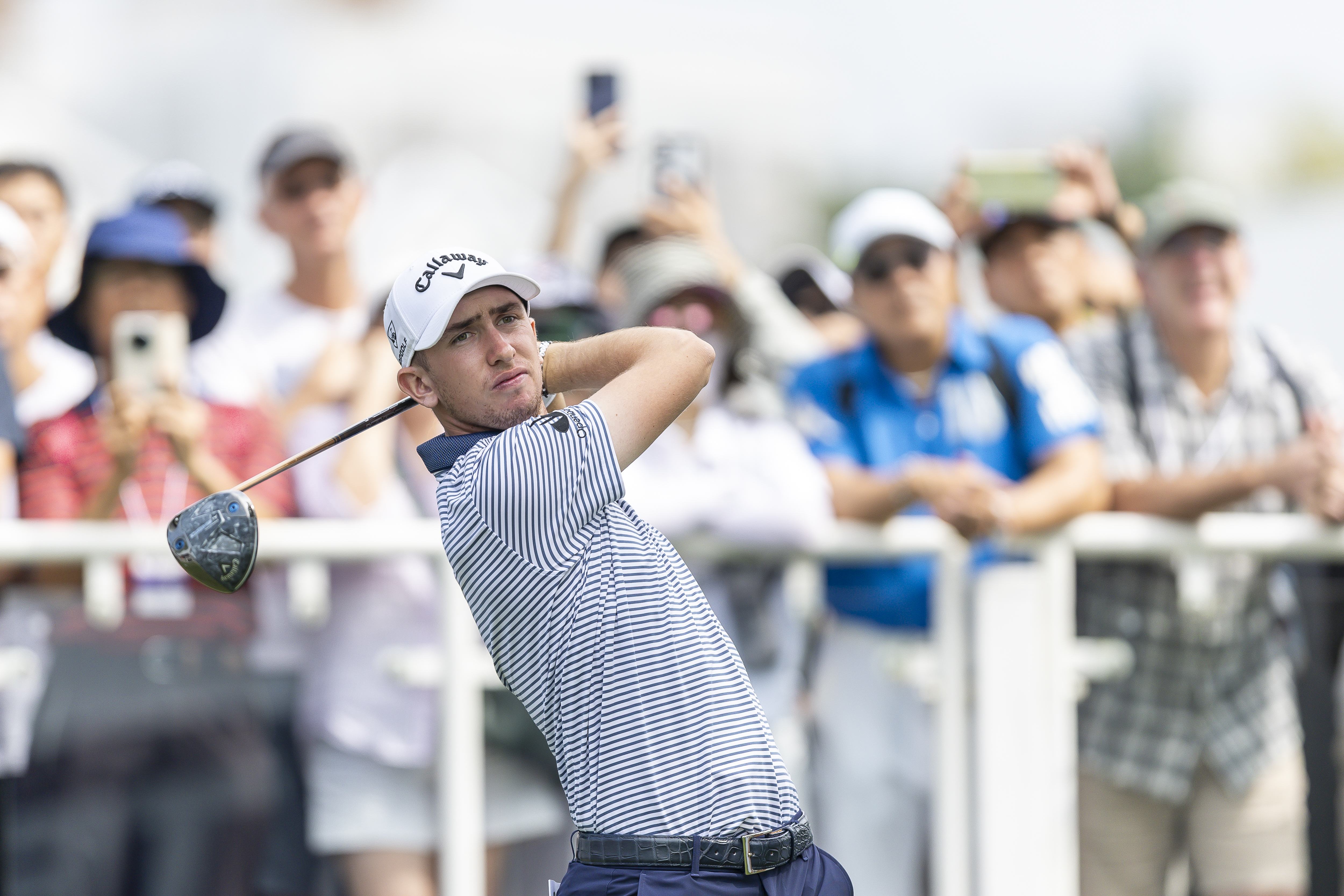 Tom McKibbin hits a driver off the tee