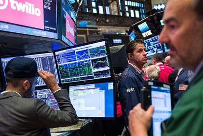 Traders on the floor of the New York Stock Exchange Thursday.