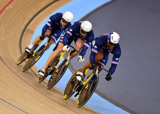 The French team lead by Gregory Bauge compete in the Men's Team Sprint Qualification during the UCI Track Cycling World Championships