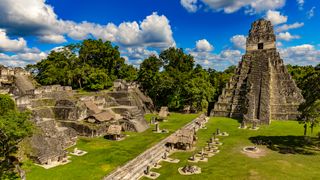 The Grand Plaza with the North Acropolis and Temple I at Tikal in Guatemala. 