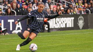 Trinity Rodman #2 of the Washington Spirit crosses the ball during a game between Bay FC and Washington Spirit at Audi Field on November 10, 2024 in Washington, DC.