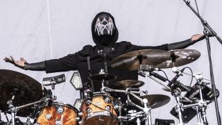 Sleep Token's drummer performing onstage
