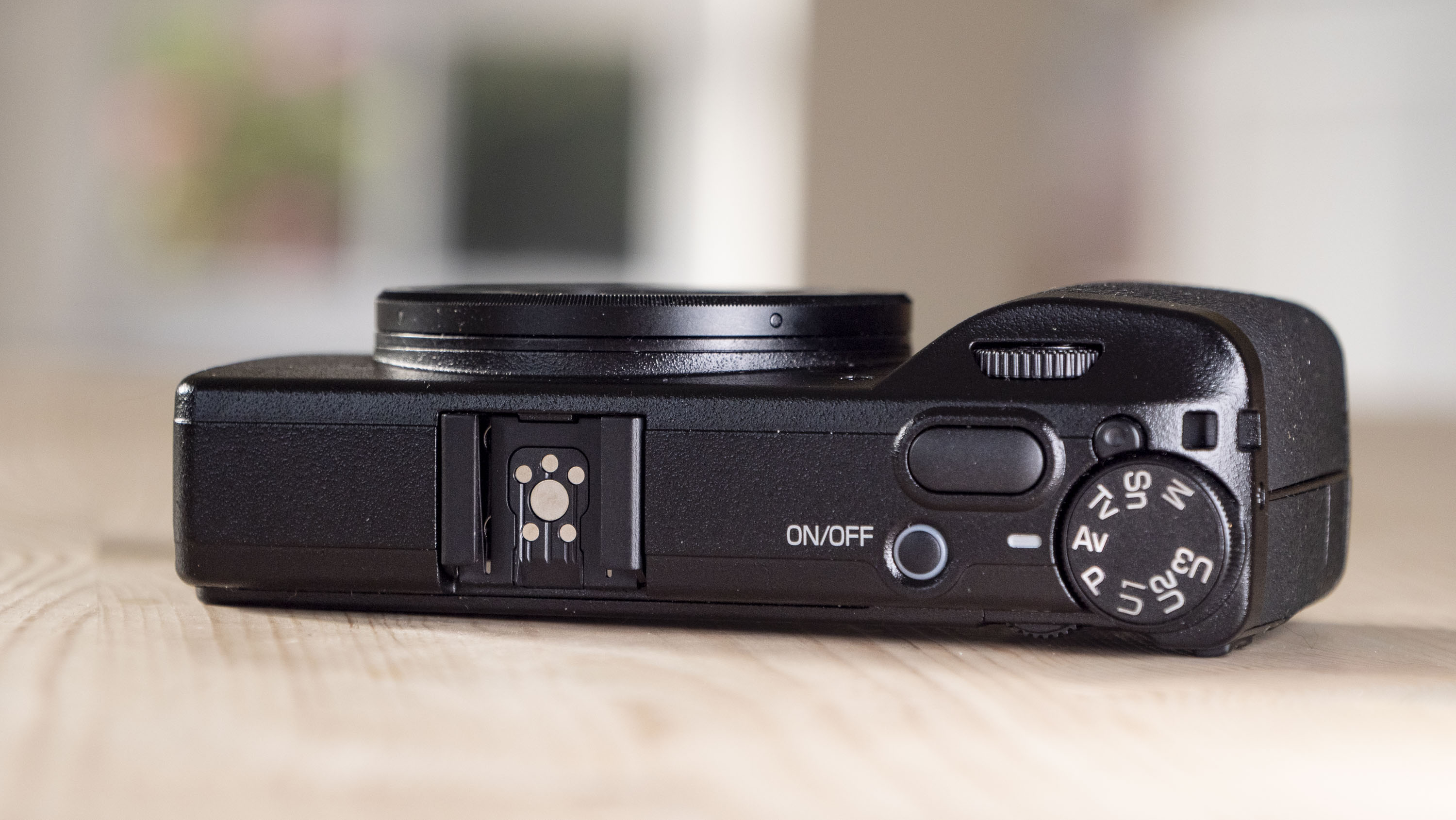 Closeup of the Ricoh GR IV compact camera's hotshoe