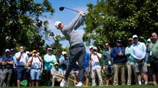 Rory McIlroy hits a drive during a practice round ahead of the 2025 Masters