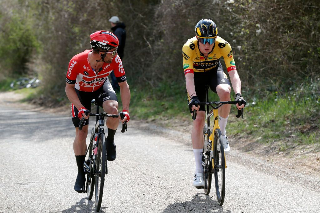 VALKENBURG NETHERLANDS APRIL 10 LR Victor Campenaerts of Belgium and Team Lotto Soudal and Nathan Van Hooydonck of Belgium and Team Jumbo Visma attack during the 56th Amstel Gold Race 2022 Mens Elite a 2541km one day race from Maastricht to Valkenburg AGR2022 WorldTour on April 10 2022 in Valkenburg Netherlands Photo by Bas CzerwinskiGetty Images