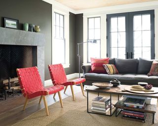 Grey living room with red chairs