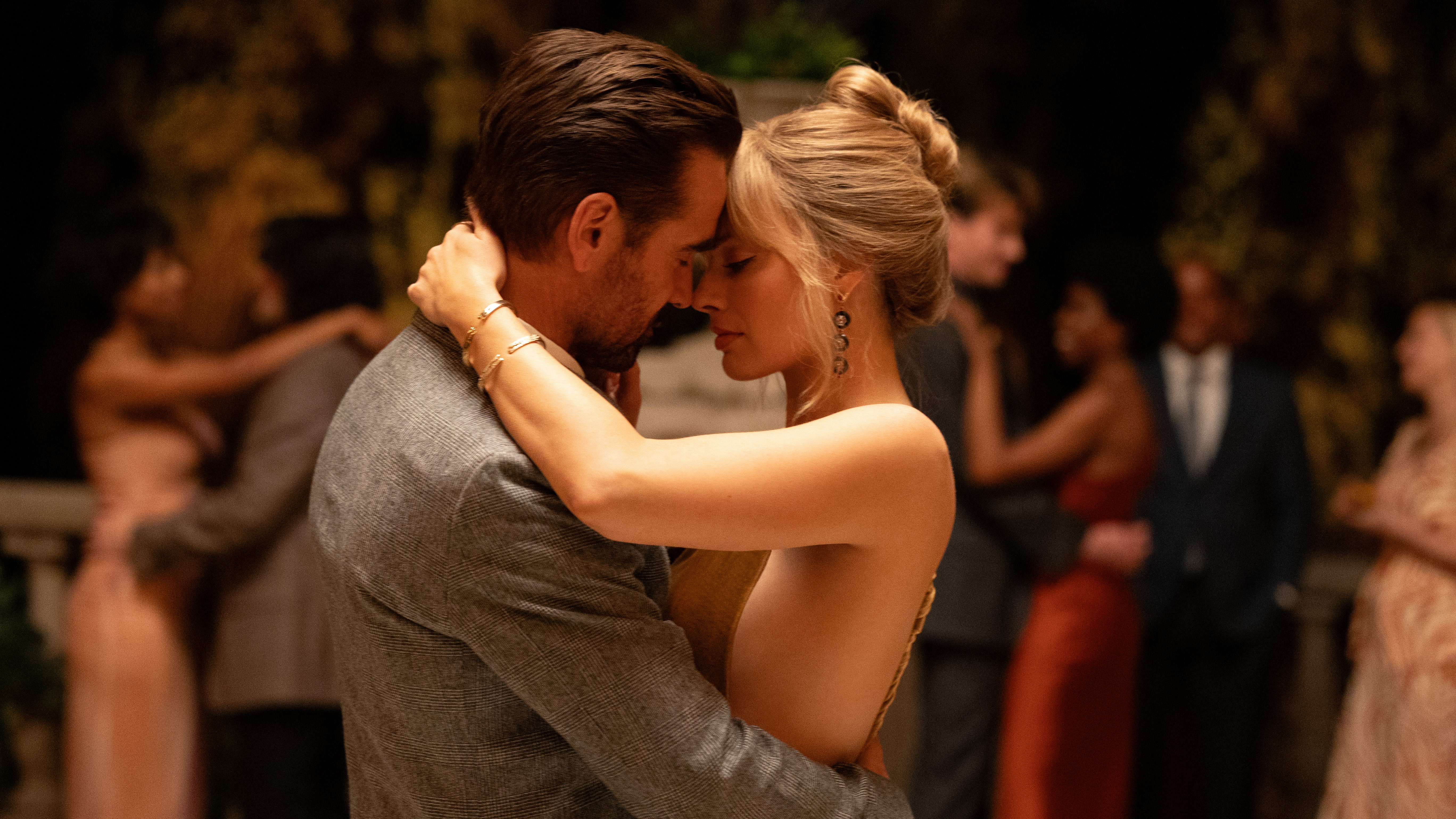 L-R: Colin Farrell and Margot Robbie dance together in a scene from &quot;A Big Bold Beautiful Journey&quot;