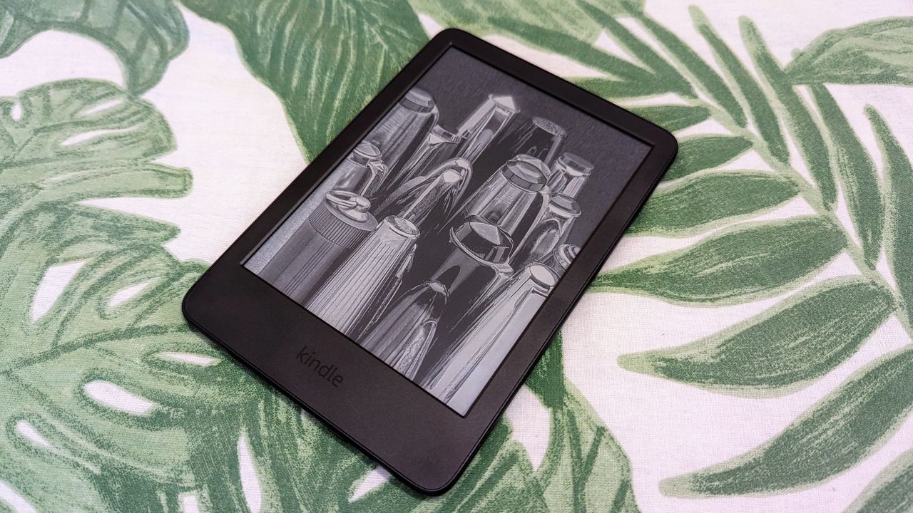 Amazon Kindle (2022) review: e-reader on a bedsheet with leaves 