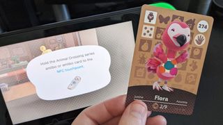 Scanning Flora amiibo card in Animal Crossing: New Horizons