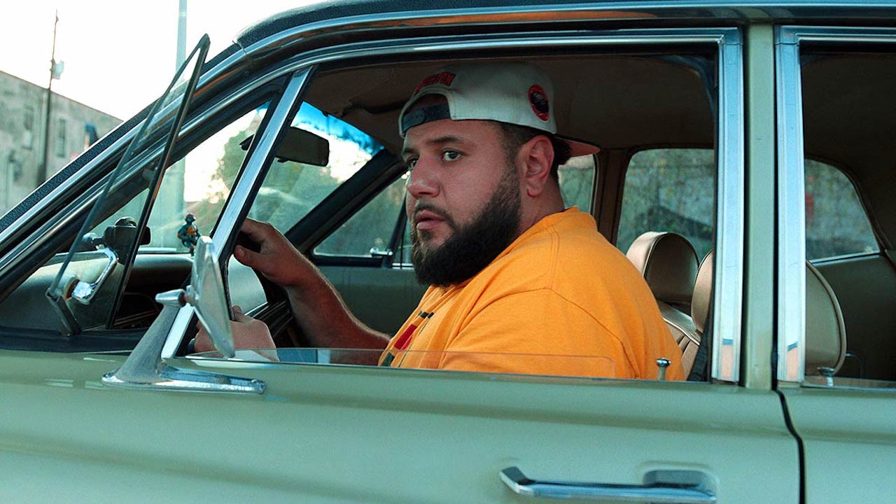 Mohamed Amer in a car on Netflix's Mo