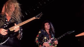 Adrian Vandenberg and Steve Vai onstage with Whitesnake in 1991