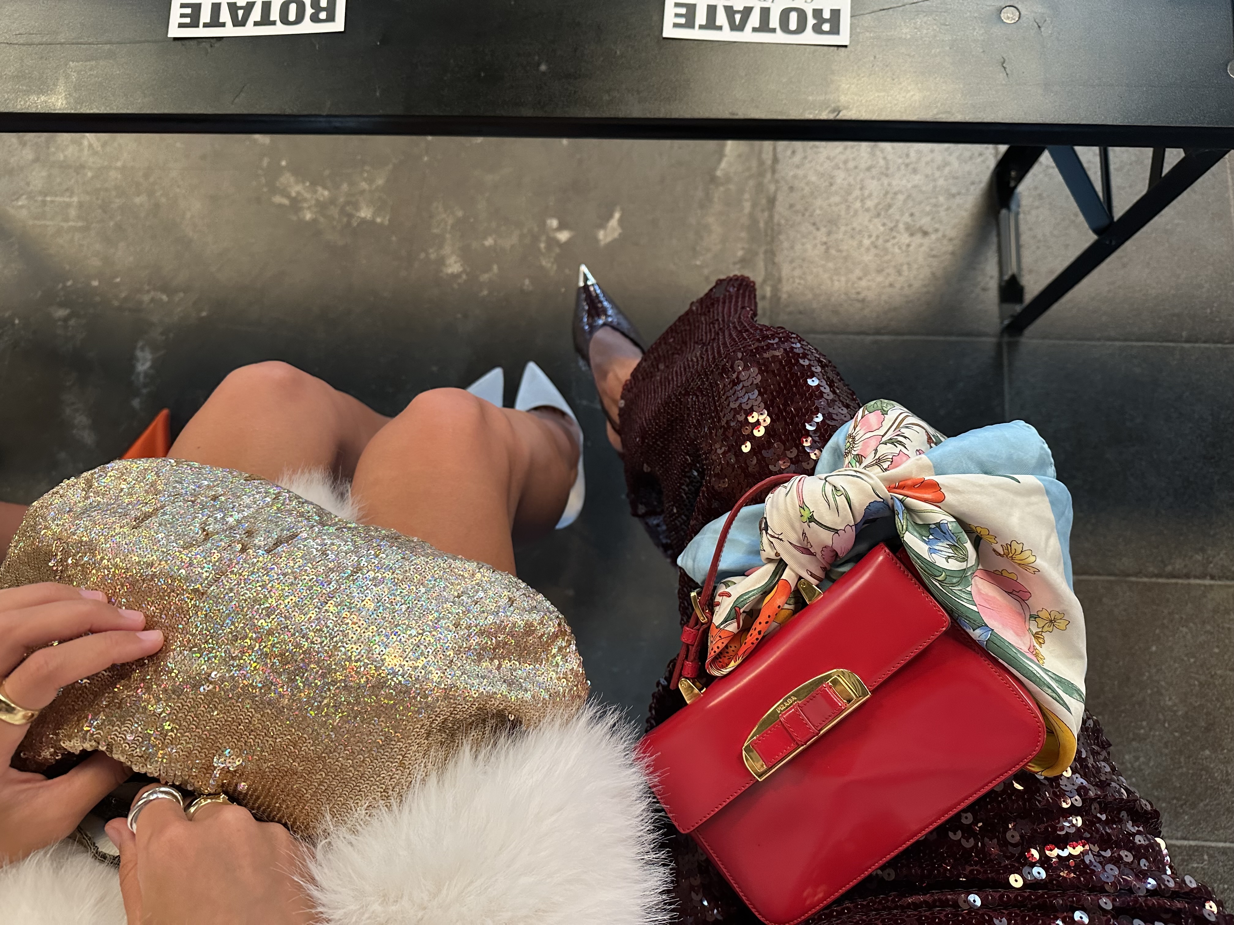 Larissa Mills demonstrating how to style bold handbags