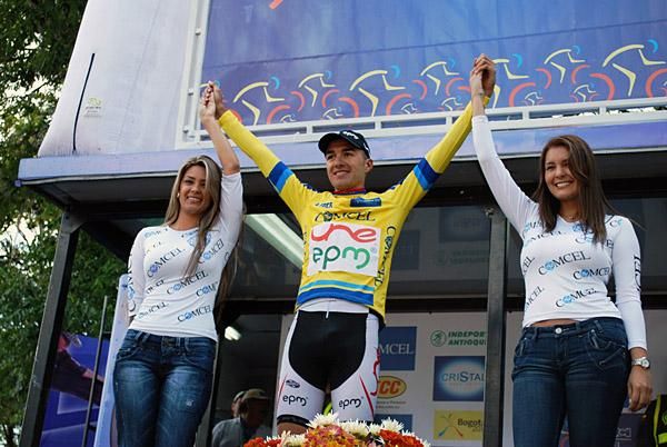Race leader Juan Pablo Suarez salutes from the podium.