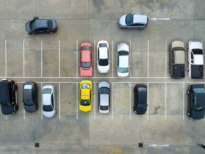 Cars in a parking lot. 