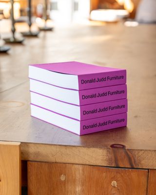 Stack of Donald Judd Furniture books