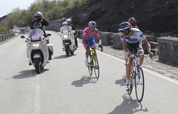 Contador looks back to see a suffering Scarponi