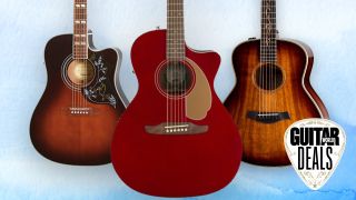 Three acoustic guitars on a blue background