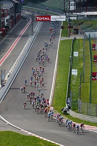 The peloton on the race track at Spa-Francorchamps