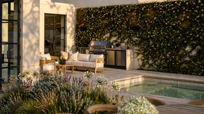 A modular outdoor kitchen next to a pool