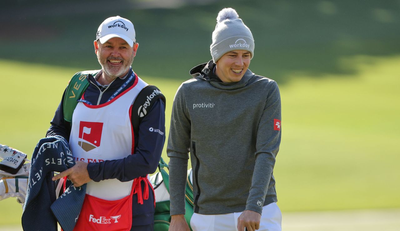 Billy Foster and Matt Fitzpatrick laugh whilst waiting on the fairway