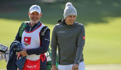 Billy Foster and Matt Fitzpatrick laugh whilst waiting on the fairway