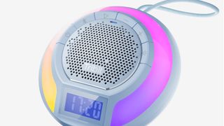 Tribit AquaEase Bluetooth Shower speaker on white background, dsiplaying the halo of lights around the speaker