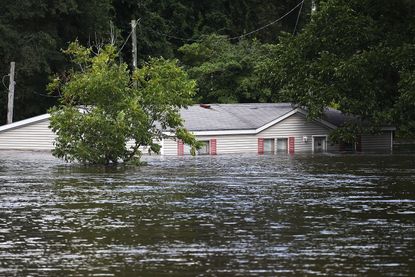 Flood waters around a home in Spring Lake, North Carolina.