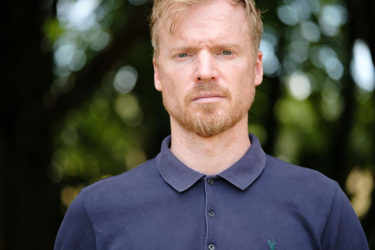 Viltrox AF 90mm F2.2 EVO and Fujifilm XF 90mm f/2 R LM WR lens comparisons: upper body portrait of a man with backlit trees