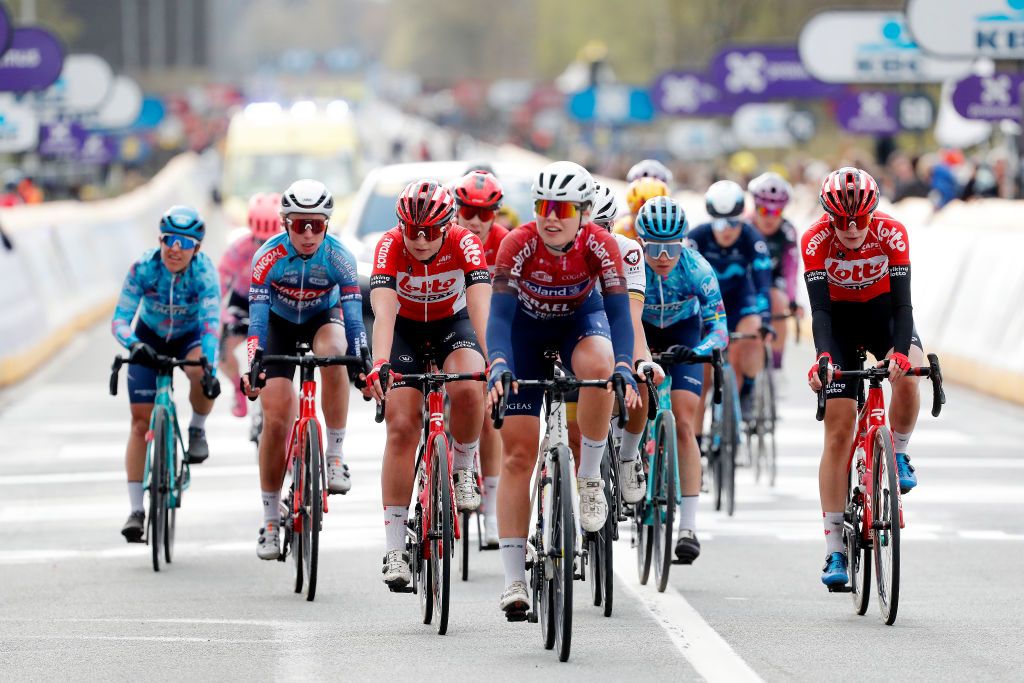 OUDENAARDE BELGIUM APRIL 03 Kylie Waterreus of Netherlands and Mieke Docx of Belgium and Team Lotto Soudal Ladies cross the finishing line during the 19th Ronde van Vlaanderen Tour des Flandres 2022 Womens Elite a 1586km one day race from Oudenaarde to Oudenaarde RVV22 RVVwomen on April 03 2022 in Oudenaarde Belgium Photo by Bas CzerwinskiGetty Images