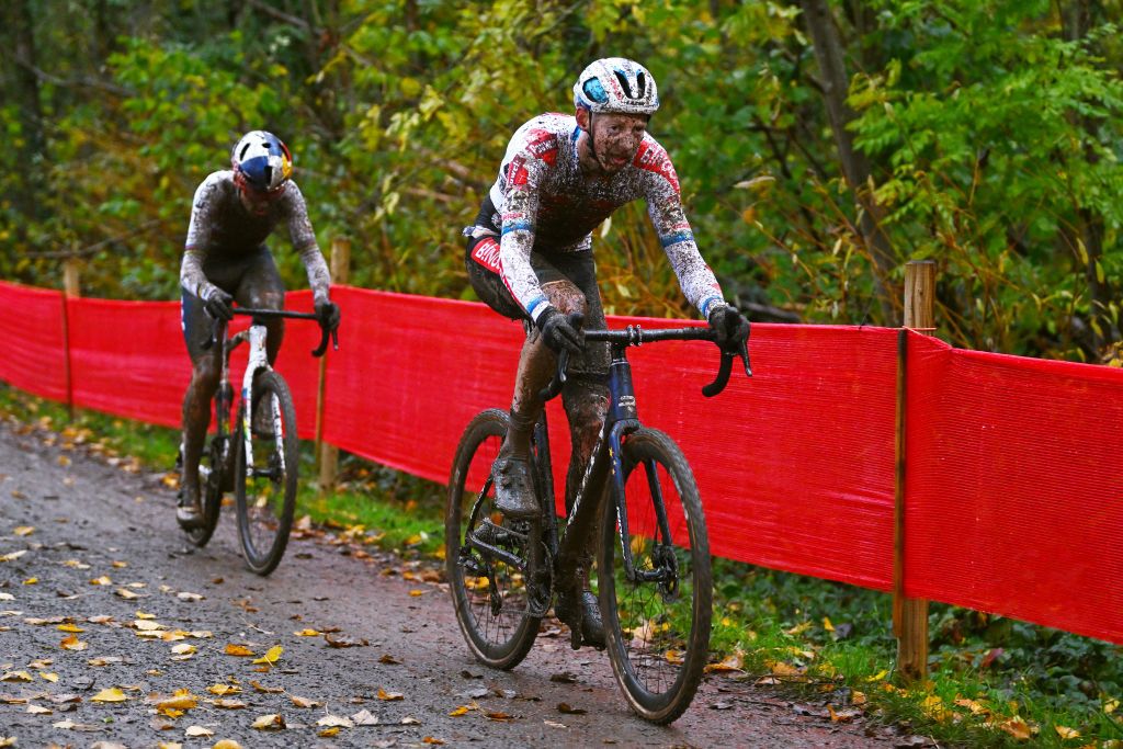 OVERIJSE BELGIUM NOVEMBER 20 Michael Vanthourenhout of Belgium and Team Pauwels Sauzen Bingoal competes ahead of Thomas Pidcock of United Kingdom and Team INEOS Grenadiers during the 62nd UCI Cyclocross World Cup Druivencross Overijse 2022 Mens Elite CXWorldCup Overijse Cyclocross on November 20 2022 in Overijse Belgium Photo by Luc ClaessenGetty Images