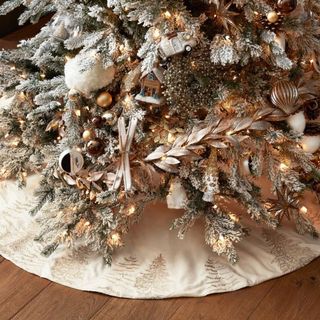 Rustic Forest Tree Skirt beneath a tree. 