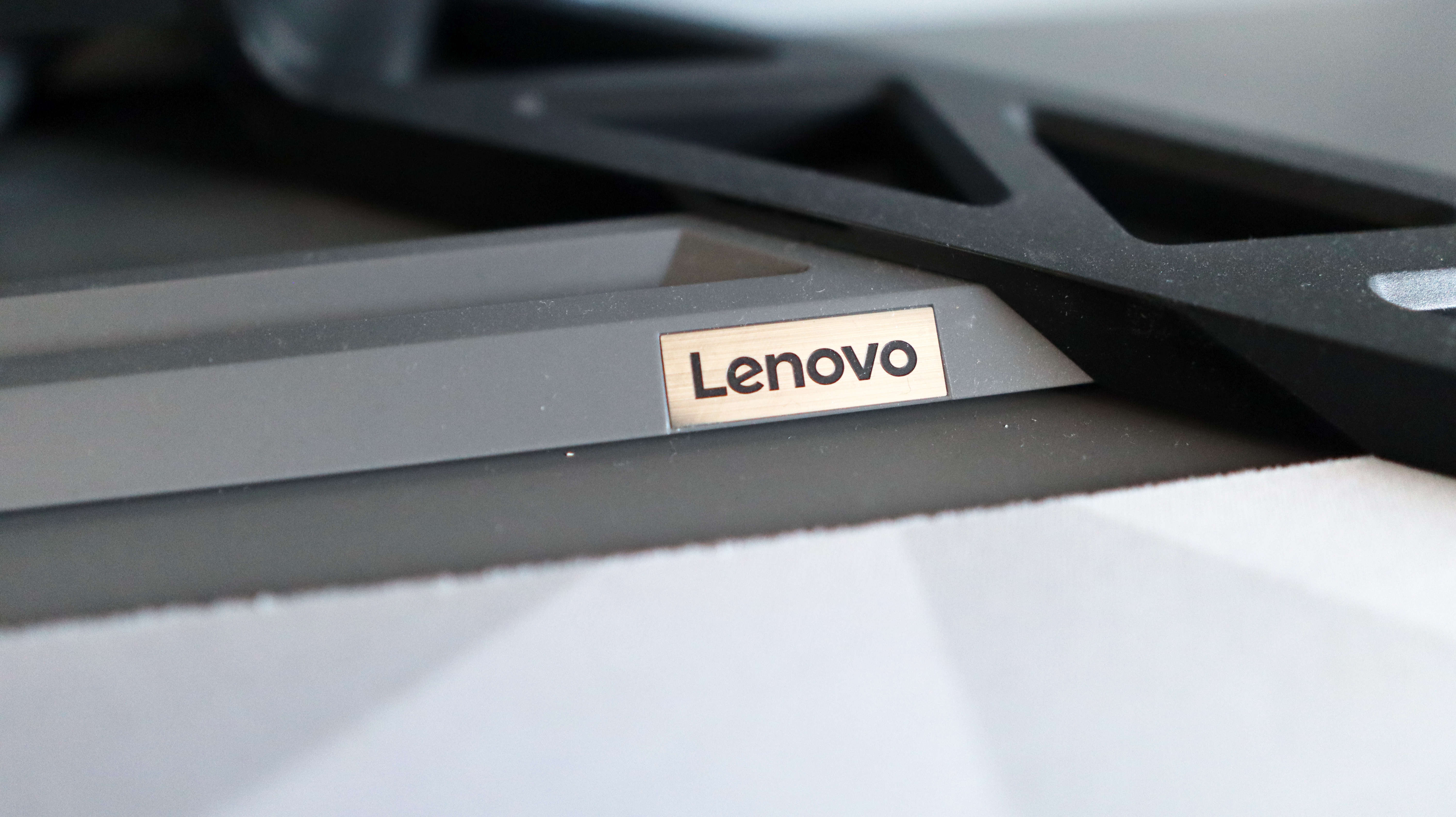 The Lenovo Legion R45w-30 ultrawide gaming monitor on a desk.
